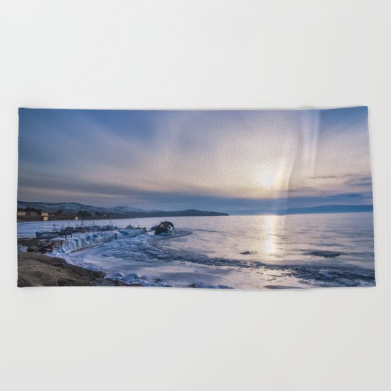 Abandoned ship at frozen wharf Beach Towel