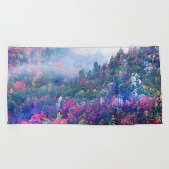 Fog over a colorful fall mountain forest Beach Towel