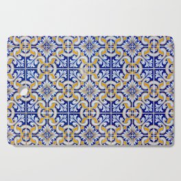 Close-up of blue, white and yellow ceramic wall tiles in Tavira, Portugal Cutting Board