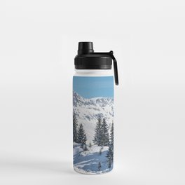 Winter landscape with snow-covered fir trees Water Bottle