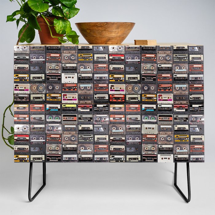 Huge collection of audio cassettes. Retro musical background Credenza