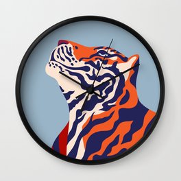 Tiger Smiling and Resting Against a Soft Blue Background Animal Wildlife Print Wall Clock