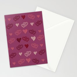 Hearts on a burgundy background. For Valentine's Day. Vector drawing for February 14th. SEAMLESS PATTERN WITH HEARTS. Anniversary drawing. For wallpaper, background, postcards. Stationery Cards