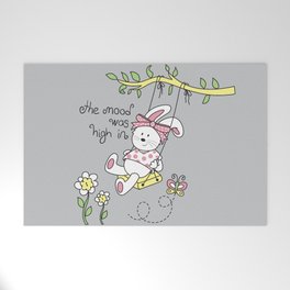 Graphics of cute bunny swinging on a tree swing. Welcome Mat