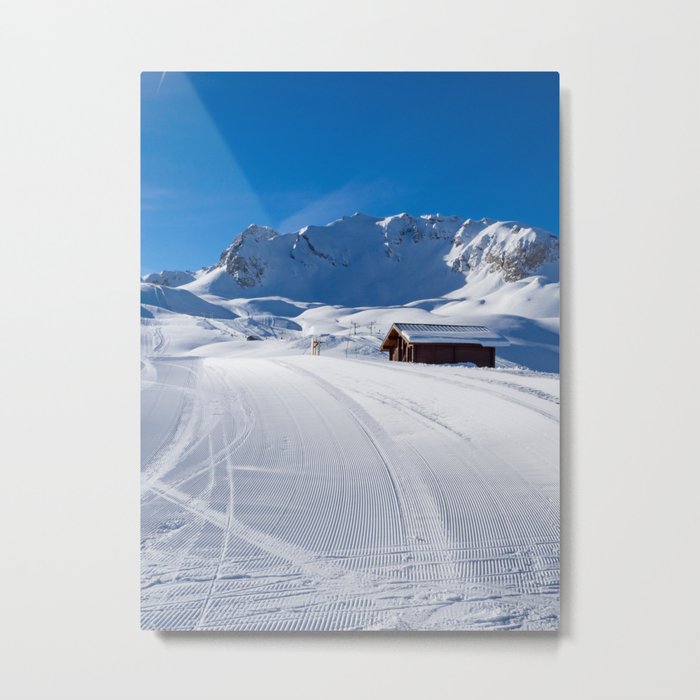 MERIBEL, FRANCE - JANUARY 2018: the white slopes in the Alps. Ski resort of Meribel, France. Sunny Metal Print