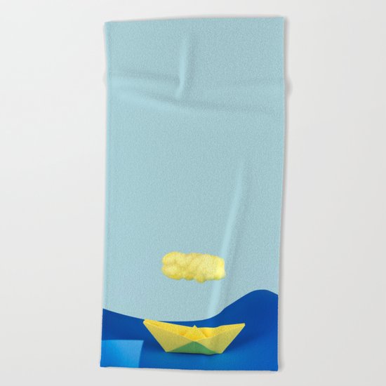 The yellow cloud over the yellow ship Beach Towel