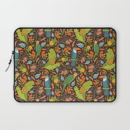 Turquoise toucan with green cockatoo amoung exotic fruits on dark background Laptop Sleeve