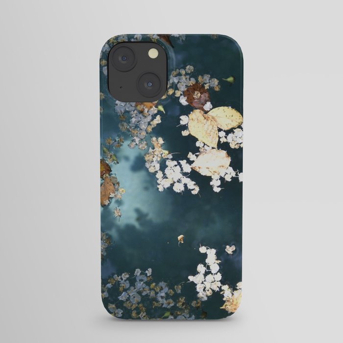Petals on a blue pool iPhone Case
