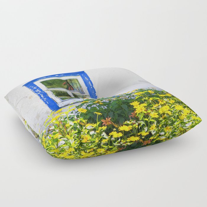 Old rustic house with high yellow flowers in the garden Floor Pillow
