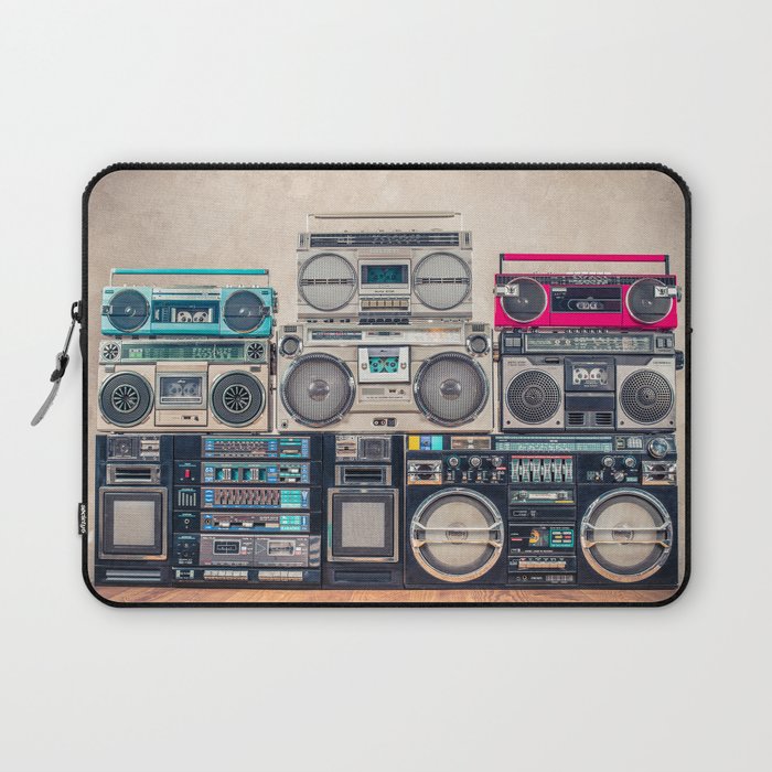 Retro old school design ghetto blaster stereo radio cassette tape recorders boombox tower from circa 1980s front concrete wall background. Vintage style filtered photo Laptop Sleeve