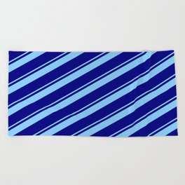 [ Thumbnail: Light Sky Blue & Blue Colored Lined Pattern Beach Towel ]