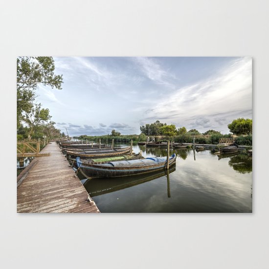 Boats in a lagoon port Canvas Print