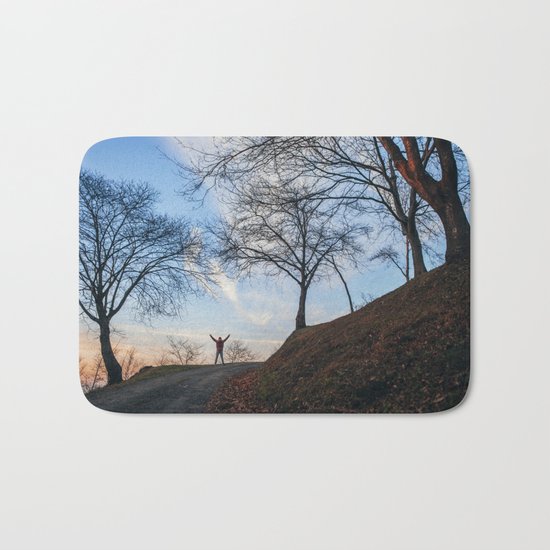 Silhouette at sunset Bath Mat