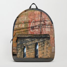 Gonzales County Backpack | Photo, Old, Buildings, Mural, Gonzalescounty, Texashillcountry, Downtown, Color, Clouds, Cloudy 