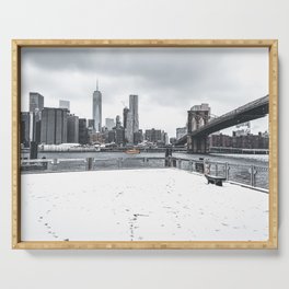 Brooklyn Bridge and Manhattan skyline during winter snowstorm blizzard in New York City Serving Tray