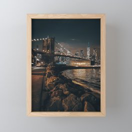 Brooklyn Bridge and Manhattan skyline at night in New York City Framed Mini Art Print
