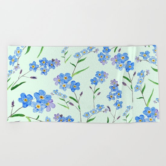 forget me not in green background Beach Towel