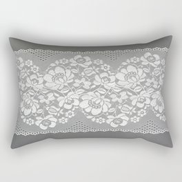White color straight strip of lace fabric on gray background. Elastic silk nylon braid border. Rectangular Pillow