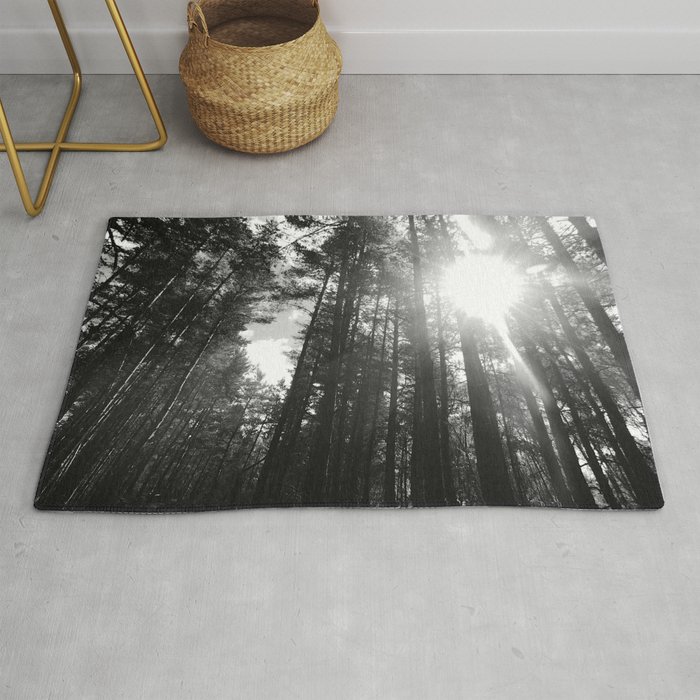 Black and White Sun in a Pine Forest Rug