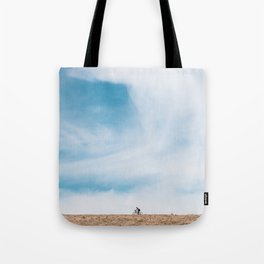 Rides under a big sky Tote Bag