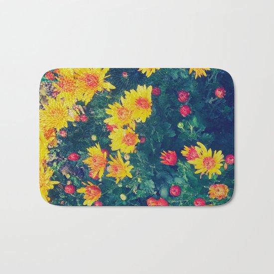 Vibrant floral blossoming in yellow, green, blue and red Bath Mat