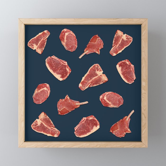 Pattern of fresh beef steaks over blue Framed Mini Art Print