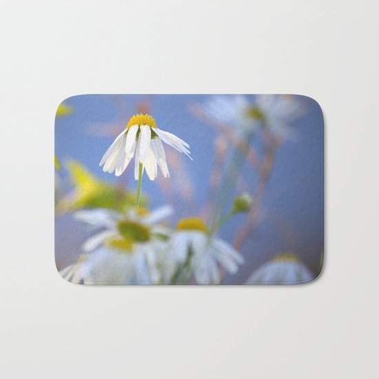 Daisies on a sunny summer day with blue sky Bath Mat