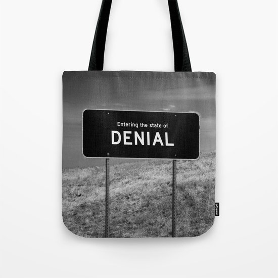 State of denial Tote Bag