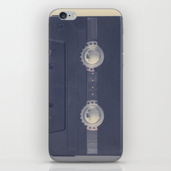 Retro black music cassette and heart shaped tape on beige background iPhone & iPod Skin