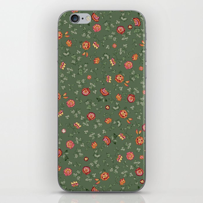 small orange-pink-red flowers on green  iPhone Skin
