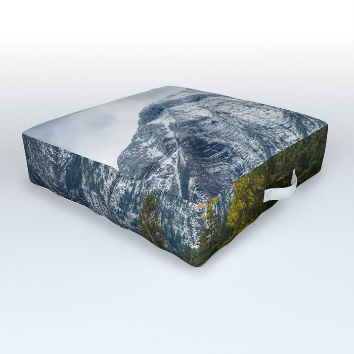 Transitions - Snowy Mountain Peak Overlooking Trees with Fall Color on Autumn Day in Glacier National Park Montana Outdoor Floor Cushion