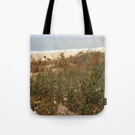 Grassy Cliff overlooking the ocean Tote Bag
