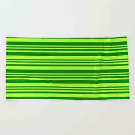 [ Thumbnail: Green and Light Green Colored Lined Pattern Beach Towel ]