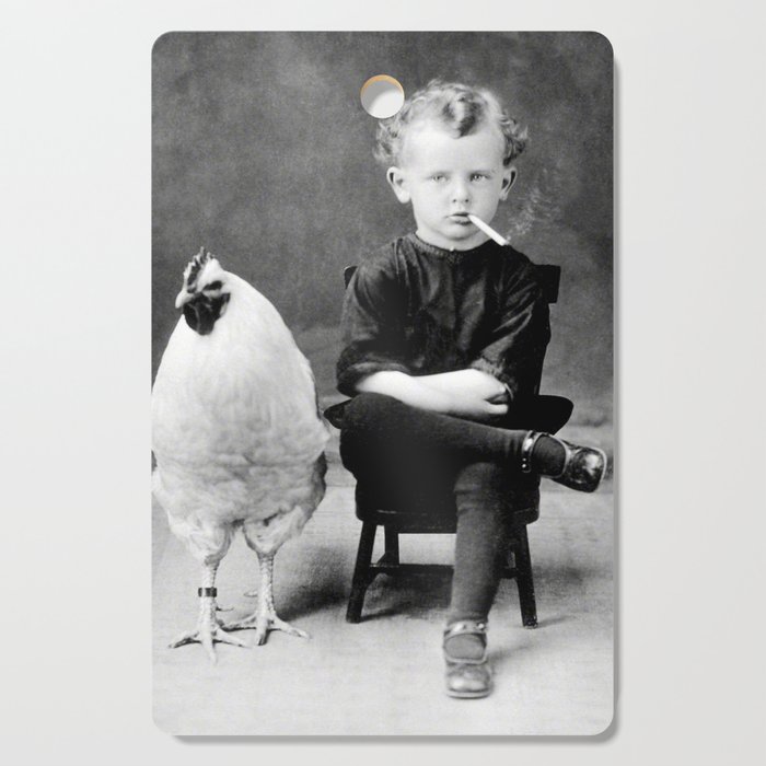 Smoking Boy with Chicken black and white photograph - photography - photographs Cutting Board