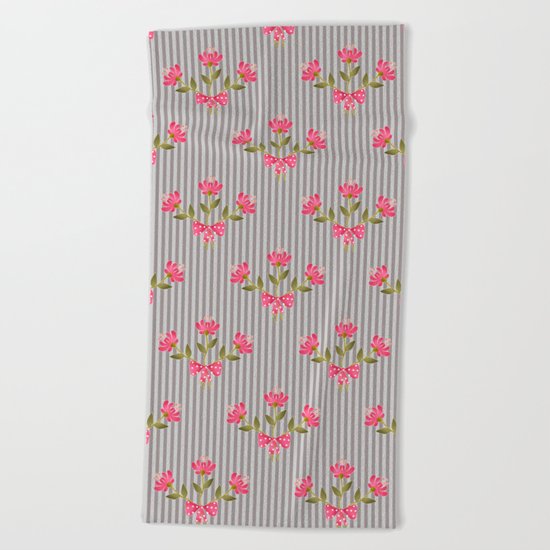 Flower bouquet on a gray striped background. Beach Towel