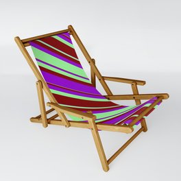 [ Thumbnail: Green, Maroon, and Dark Violet Colored Lined/Striped Pattern Sling Chair ]
