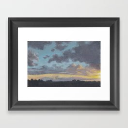 Cloudy sunset Framed Art Print