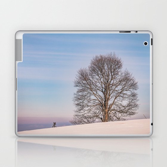 The lonely tree on a winter day Laptop & iPad Skin
