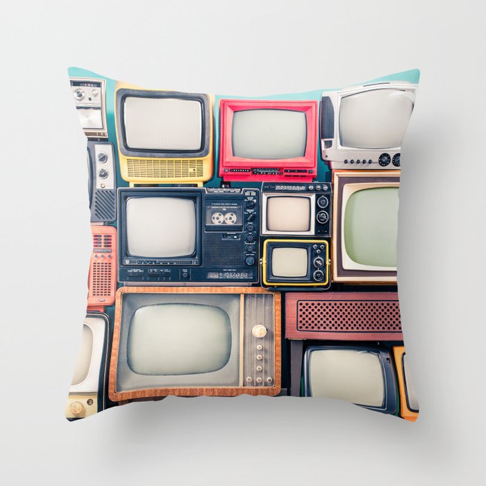 Retro TV receivers set from circa 60s, 70s and 80s of XX century, old wooden television stand with amplifier front mint blue wall background. Broadcasting, news concept. Vintage style filtered photo Throw Pillow