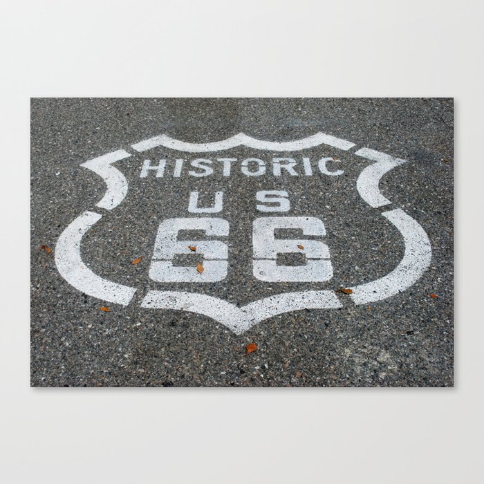 Route 66 sign on the road Canvas Print