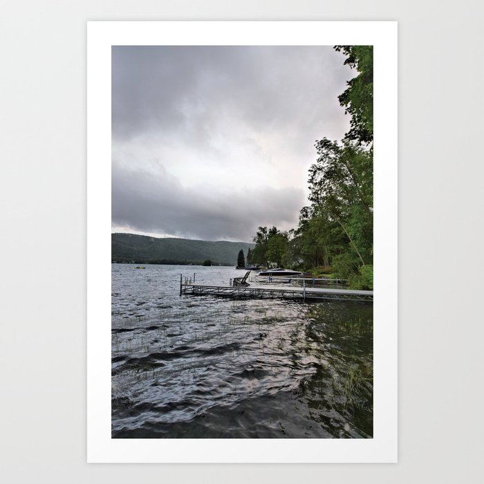 Alone in the Storm: Empty Adirondack Chairs on a Dock Art Print