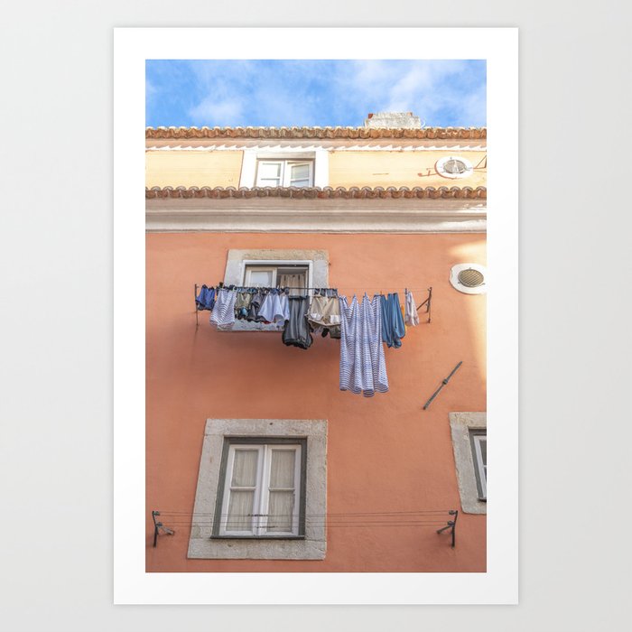 Clothes lines on a terracotta building in Alfama, Lisbon, Portugal - colorful travel photography Art Print