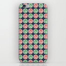 Peppermint swirl candy on navy blue iPhone Skin