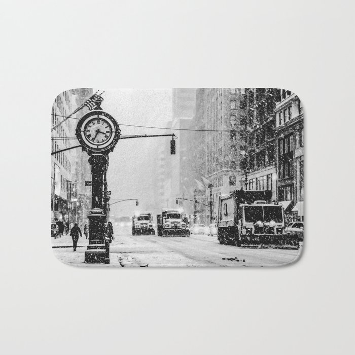 Manhattan street during winter snowstorm blizzard in New York City black and white Bath Mat