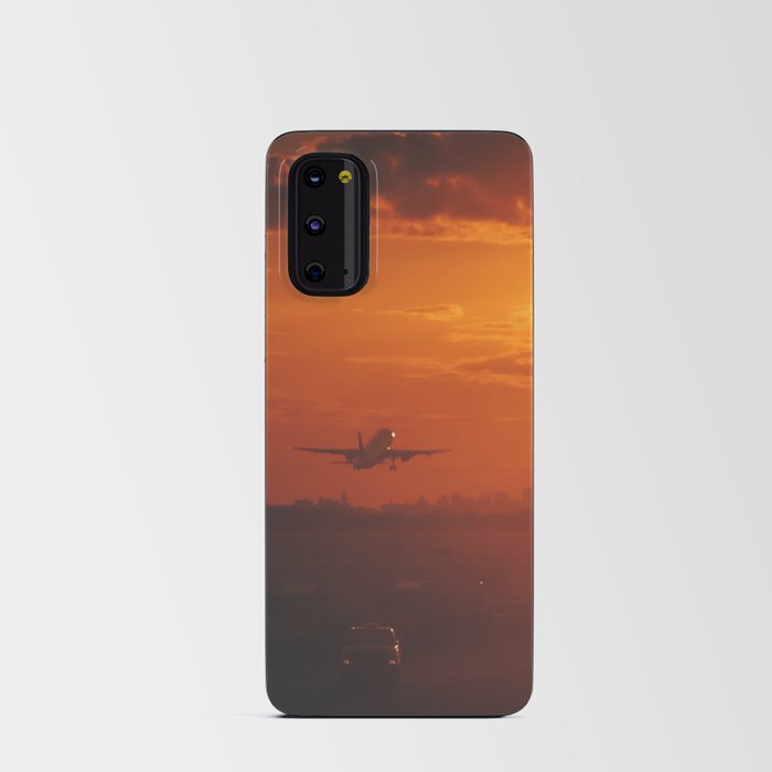 Airplane taking off from New York City airport into the sunset Android Card Case