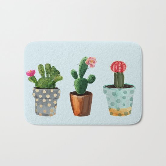 Three Cacti With Flowers On Light Blue Background Bath Mat