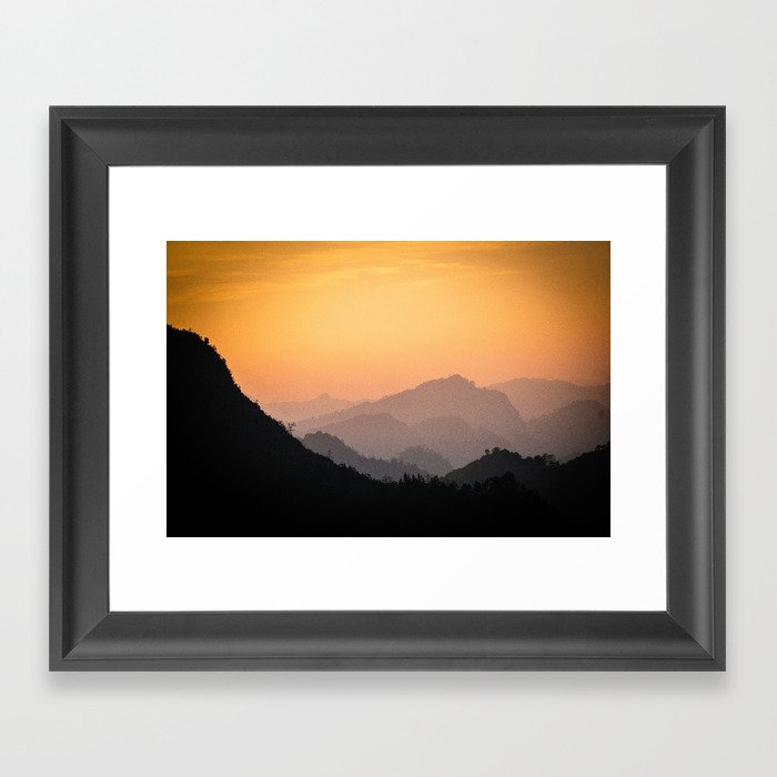 mountains at dusk Framed Art Print