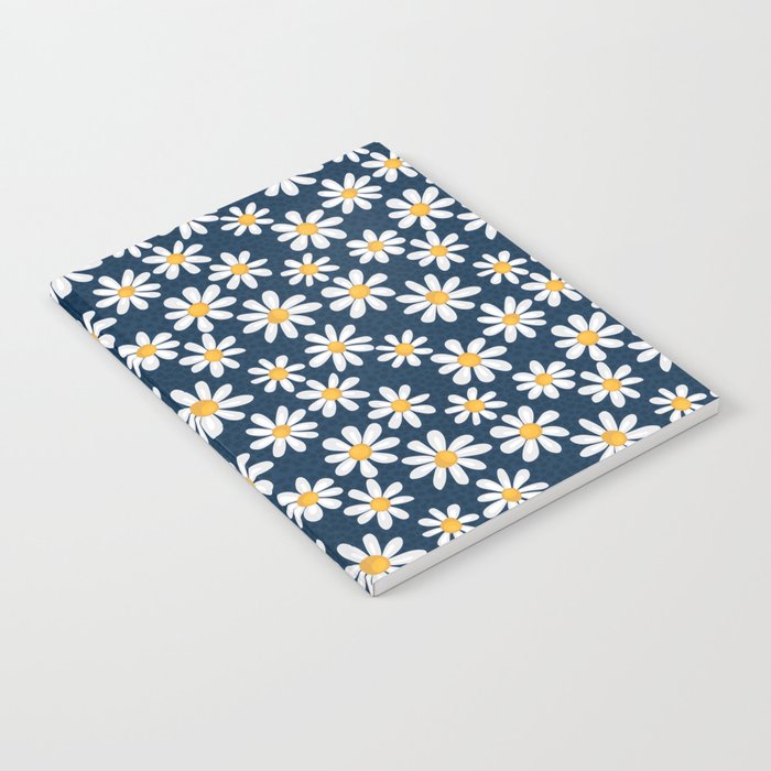 Simple and beautiful chamomile on a blue background Notebook