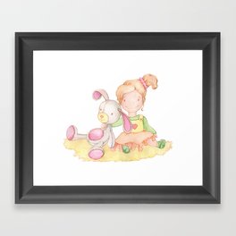 Baby girl and her bunny Framed Art Print