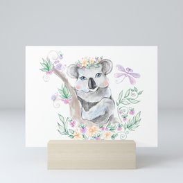 Baby koala with blue eyes and flowers Mini Art Print